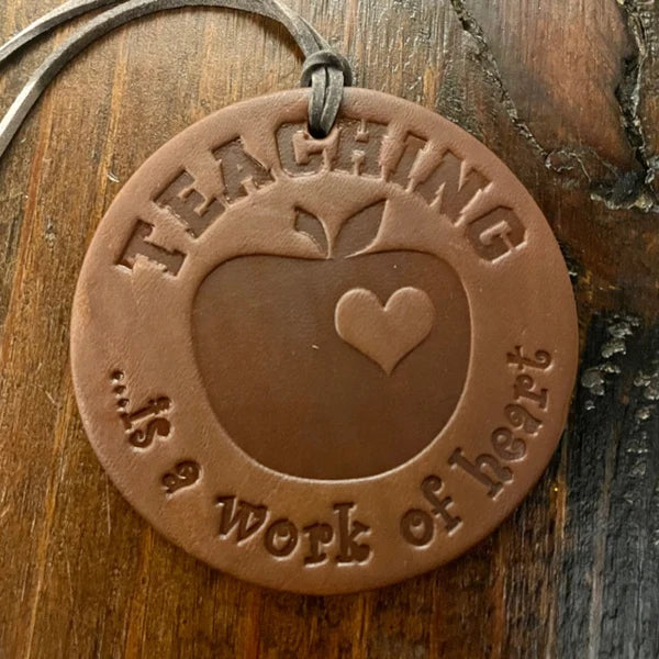 Round Teacher Car Freshie Vanilla Leather Red in Color