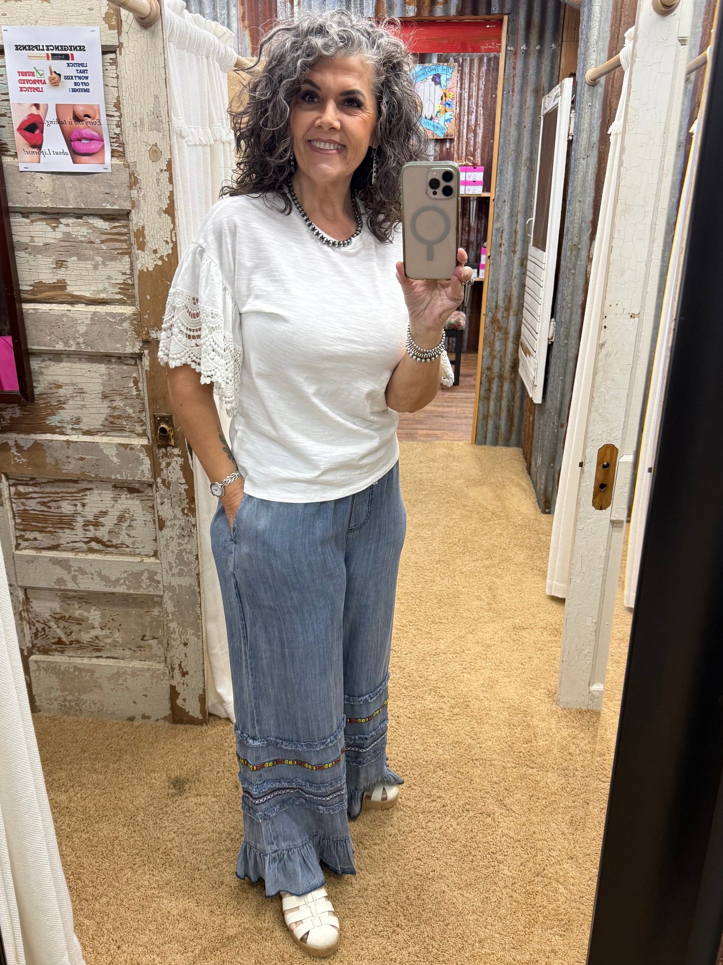 RUFFLE BOTTOM STONE WASHED CHAMBRAY PANTS