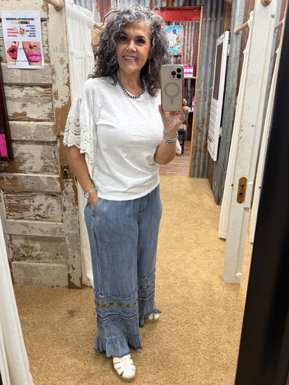 RUFFLE BOTTOM STONE WASHED CHAMBRAY PANTS